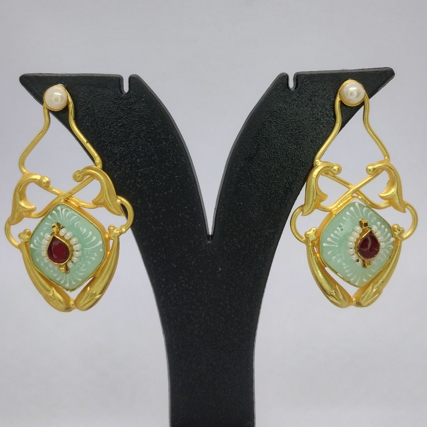 Elegant Brass Earrings with Mint Enamel and Red Stone Accent